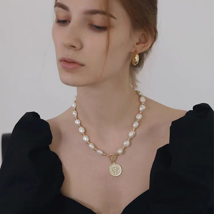 Styled Baroque Pearl Necklace With Gold Coin Pendant